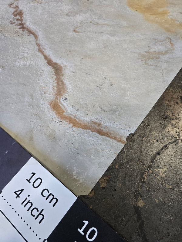 Slate-Lite Blanco corner detail with minor edge damage