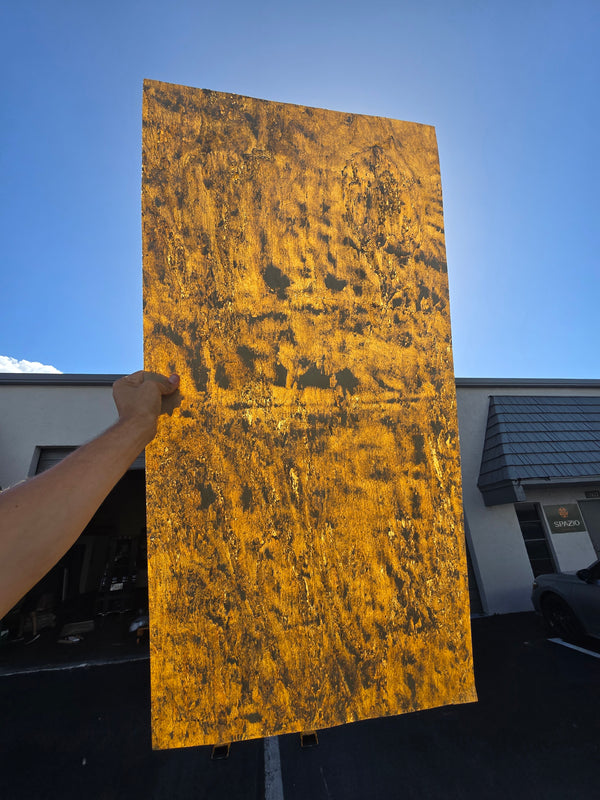Caldera Gold translucent held to the light